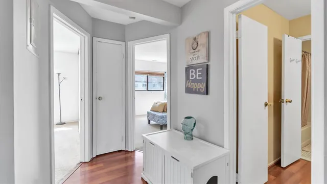 a en suite bathroom with a sink vanity and mirror