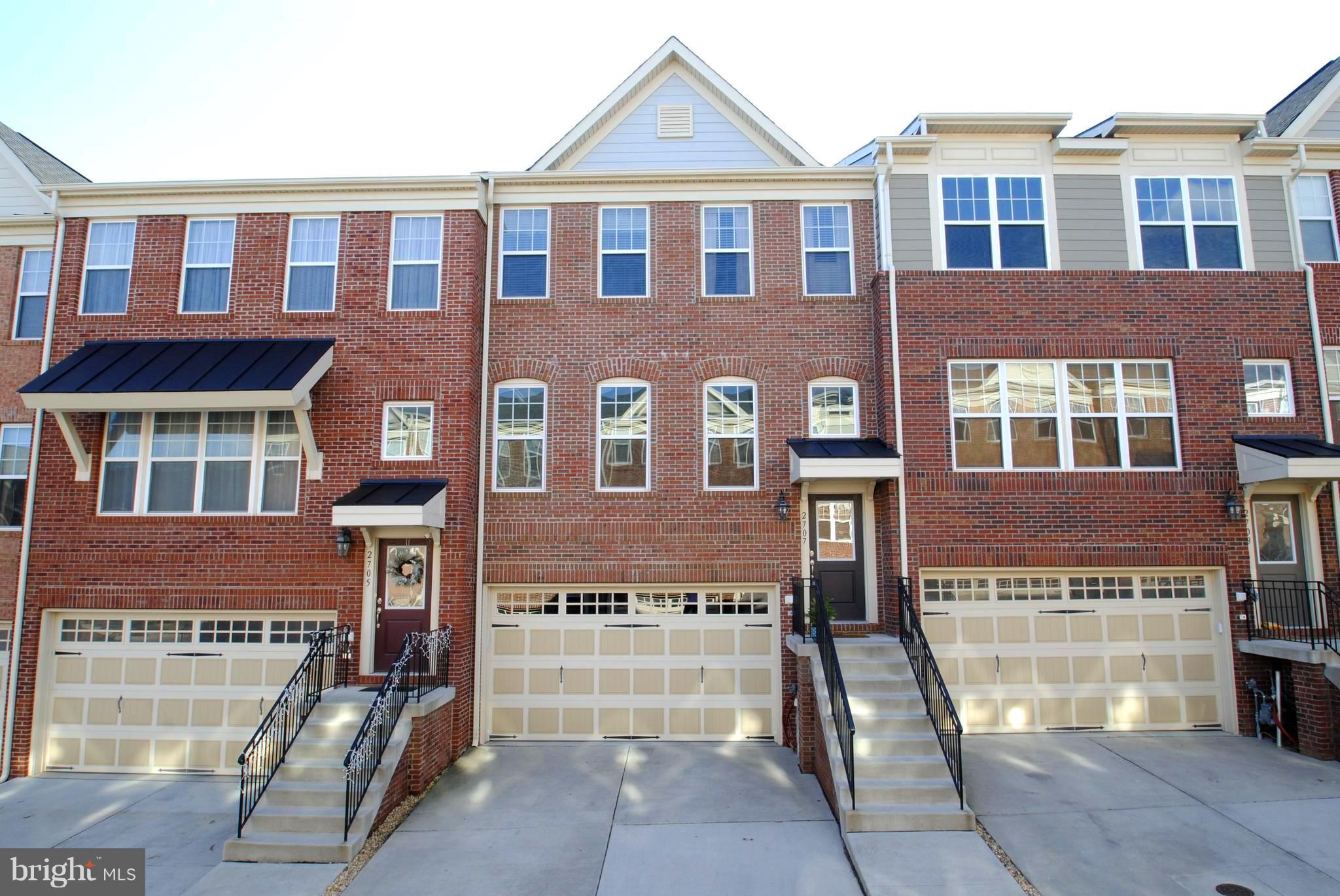 2707 Amber Crest Road Hanover, MD 21076 - Photo 1 of 30 a front view of a building with many windows
