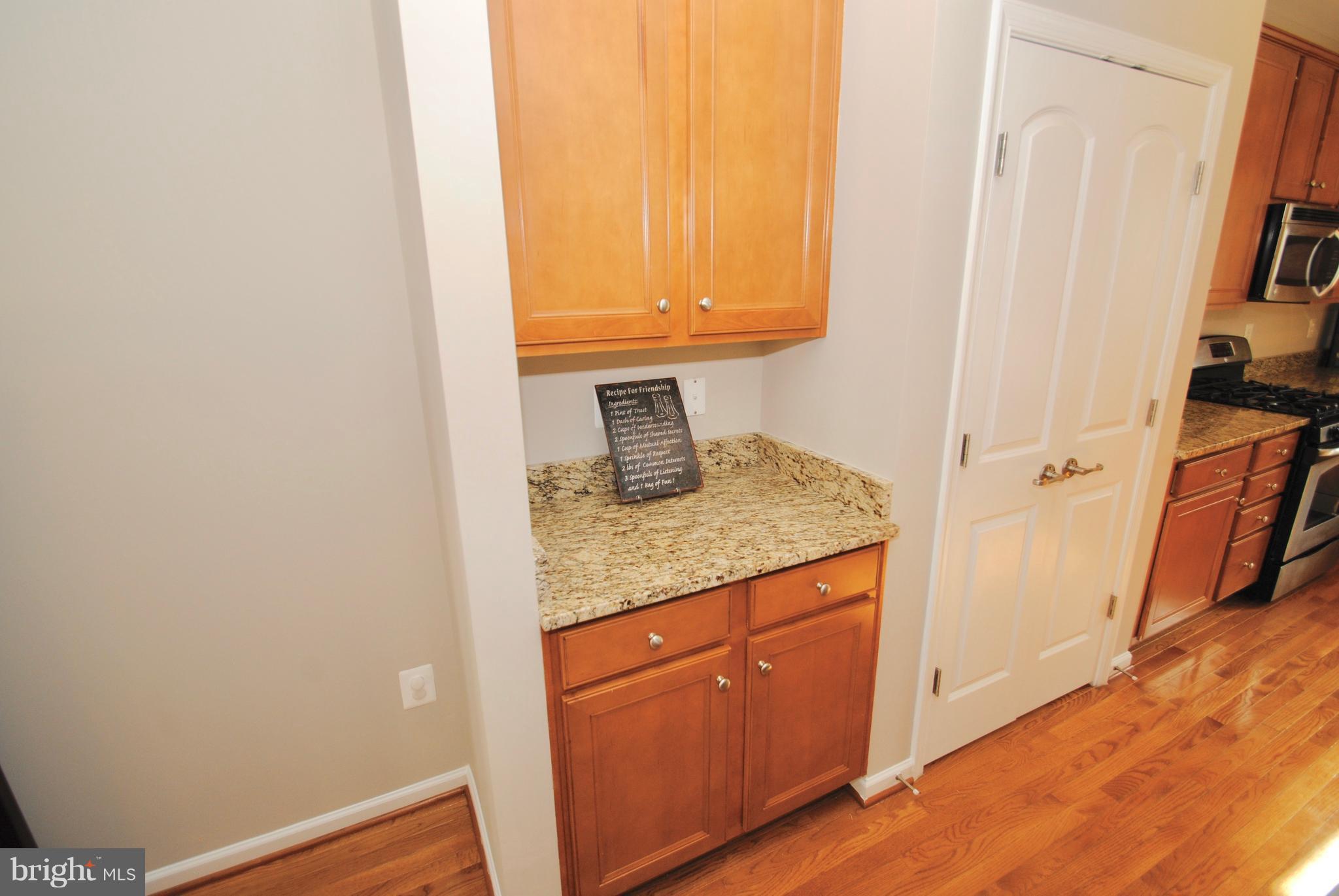 2707 Amber Crest Road Hanover, MD 21076 - Photo 9 of 30 a bathroom with a granite countertop sink and a mirror