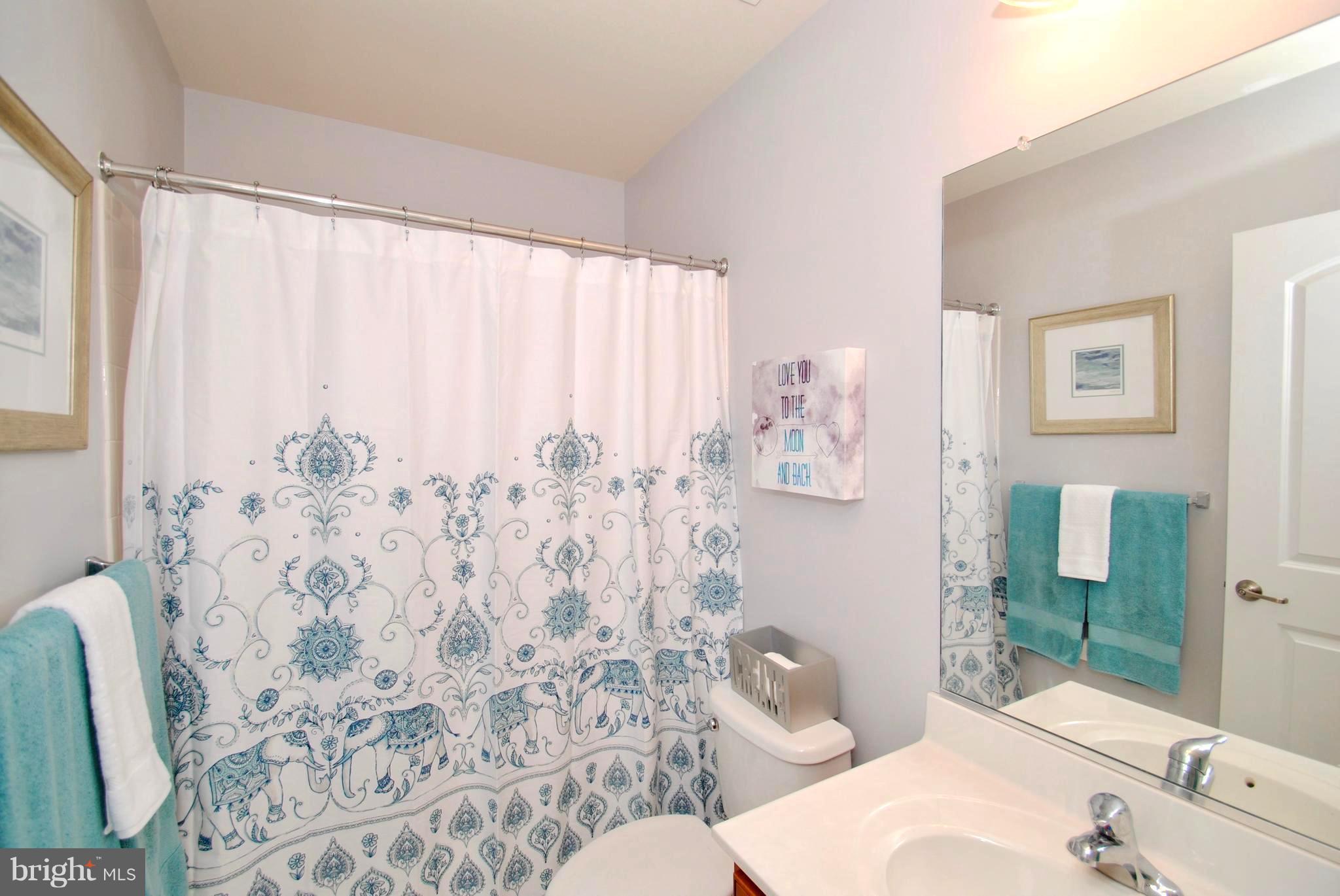 2707 Amber Crest Road Hanover, MD 21076 - Photo 18 of 30 a bathroom with a sink and a mirror