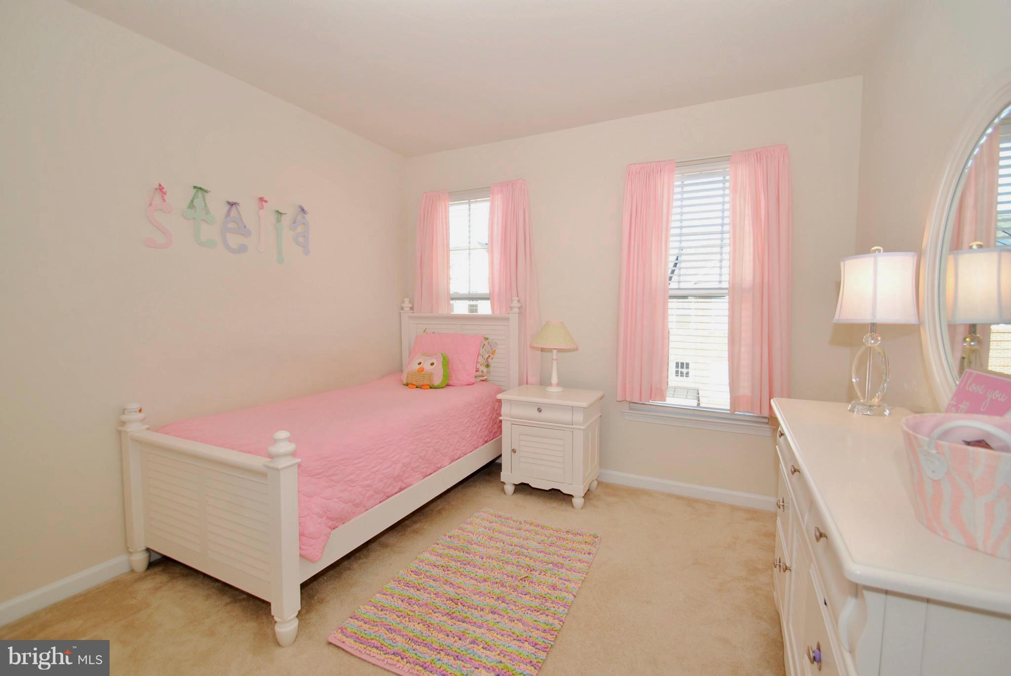 2707 Amber Crest Road Hanover, MD 21076 - Photo 19 of 30 a spacious bedroom with a bed and a window