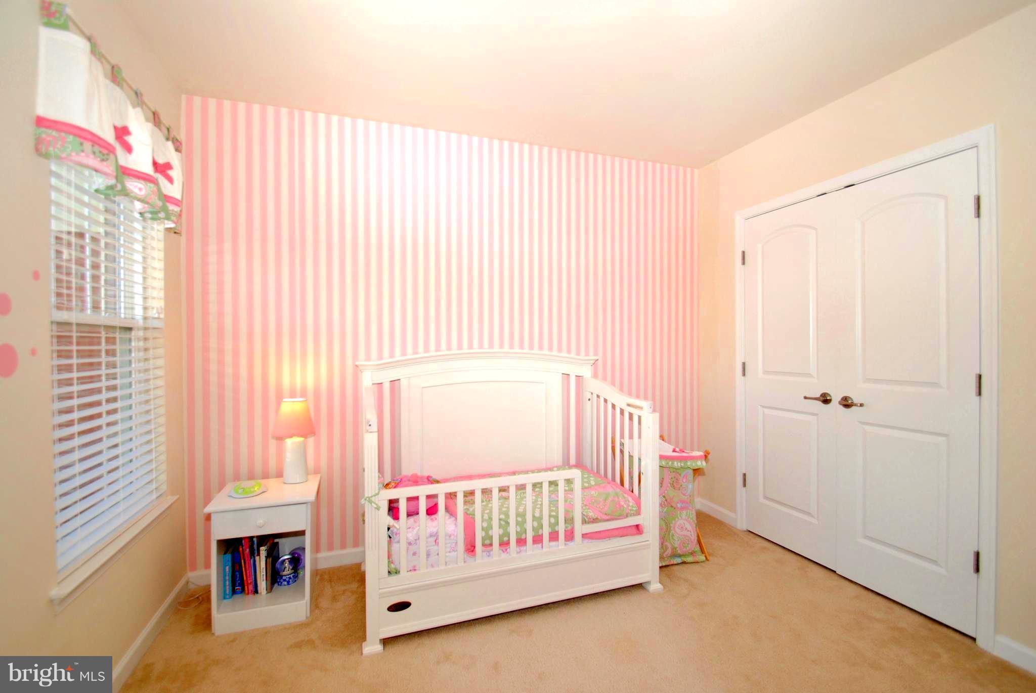 2707 Amber Crest Road Hanover, MD 21076 - Photo 22 of 30 a bedroom with furniture and a window