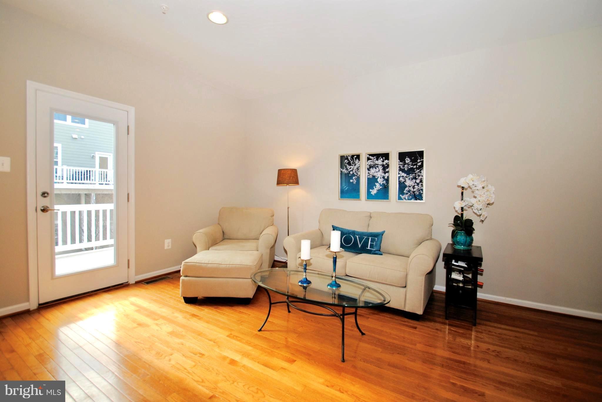 2707 Amber Crest Road Hanover, MD 21076 - Photo 6 of 30 a living room with furniture and a window