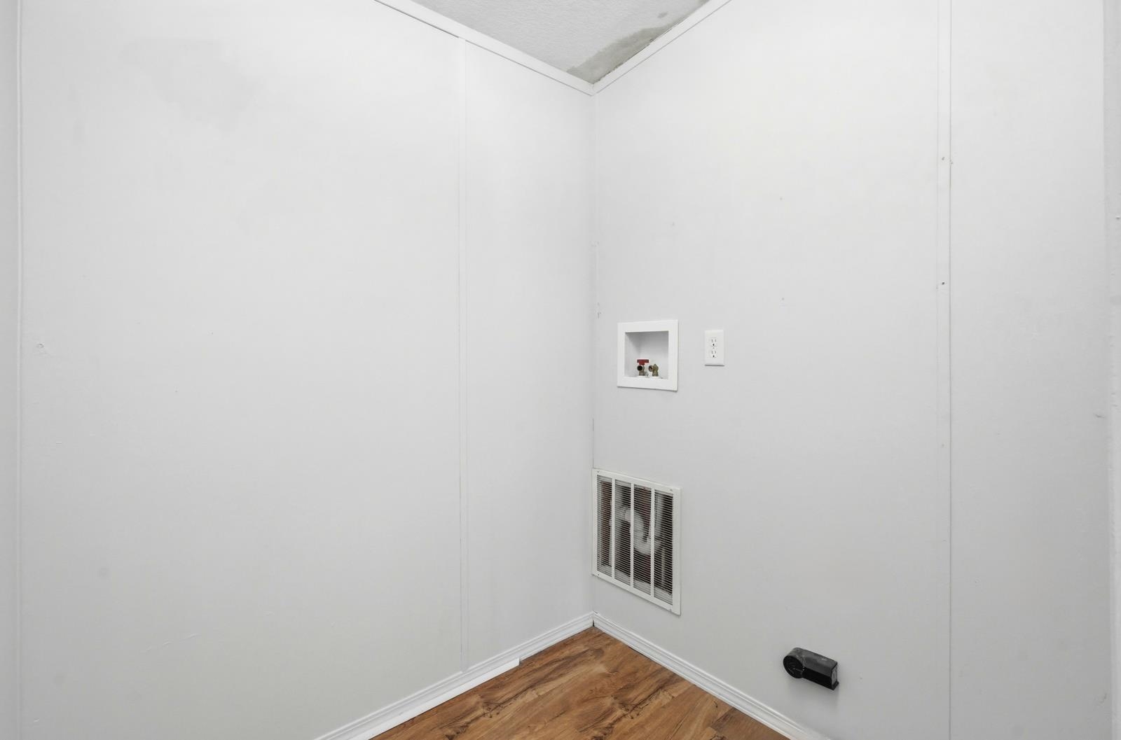 299 Cayenne Street Interlachen, FL 32148 - Photo 37 of 73 Laundry room featuring wood finished floors and hookup for a washing machine