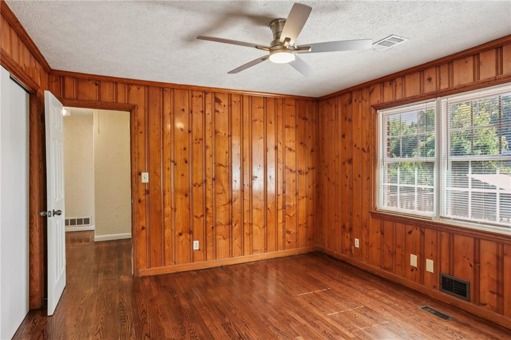 2370 Beaver Creek Road Smyrna, GA 30080 - Photo 11 of 23 an empty room with wooden floor and windows