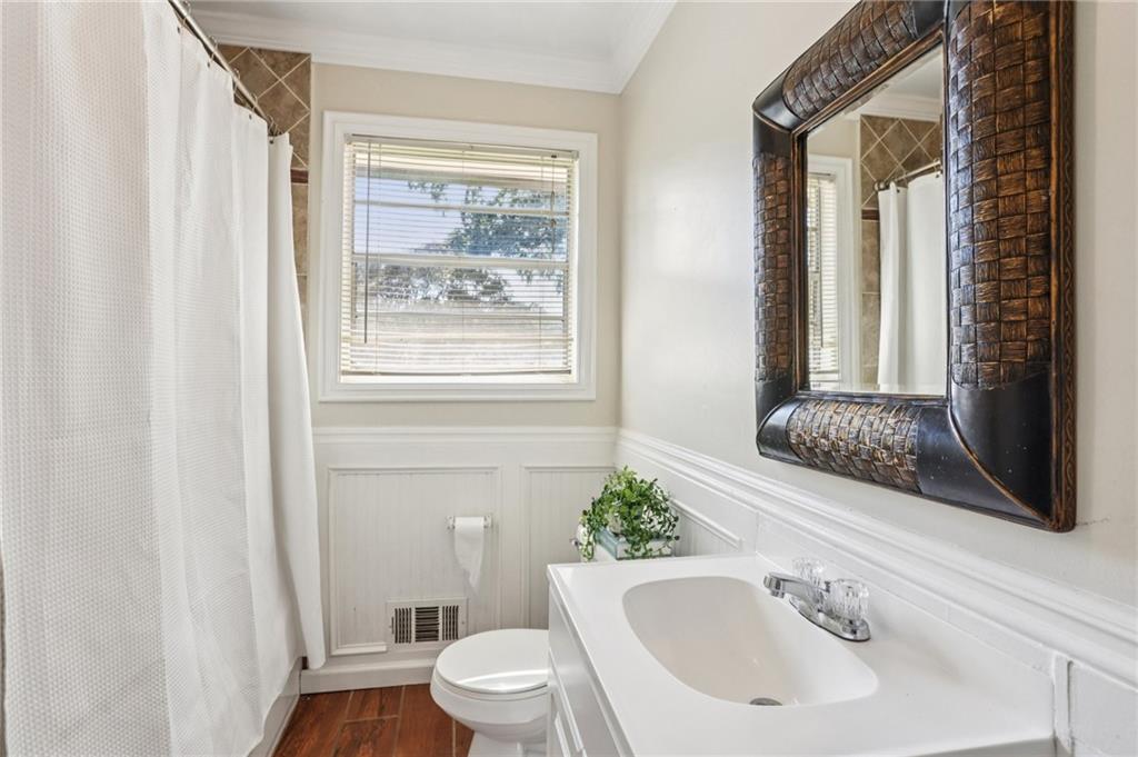 2370 Beaver Creek Road Smyrna, GA 30080 - Photo 13 of 23 a bathroom with a toilet a sink and a bathtub