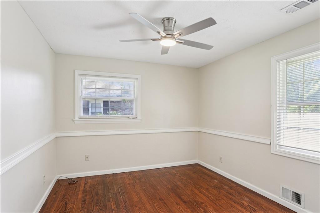 2370 Beaver Creek Road Smyrna, GA 30080 - Photo 14 of 23 an empty room with a window and a ceiling fan