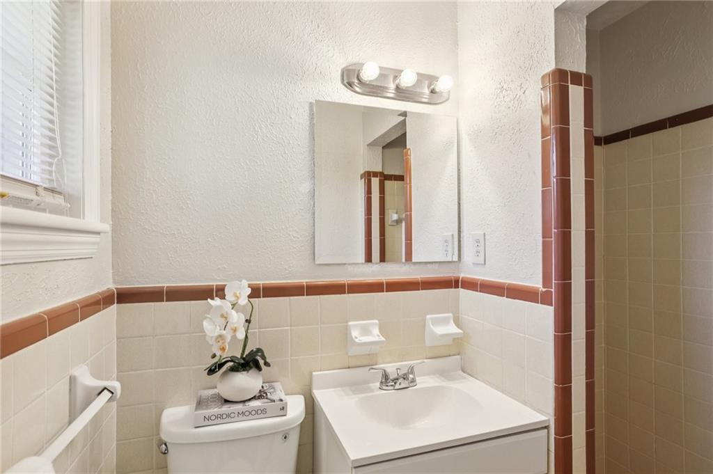 2370 Beaver Creek Road Smyrna, GA 30080 - Photo 15 of 23 a bathroom with a sink and a mirror
