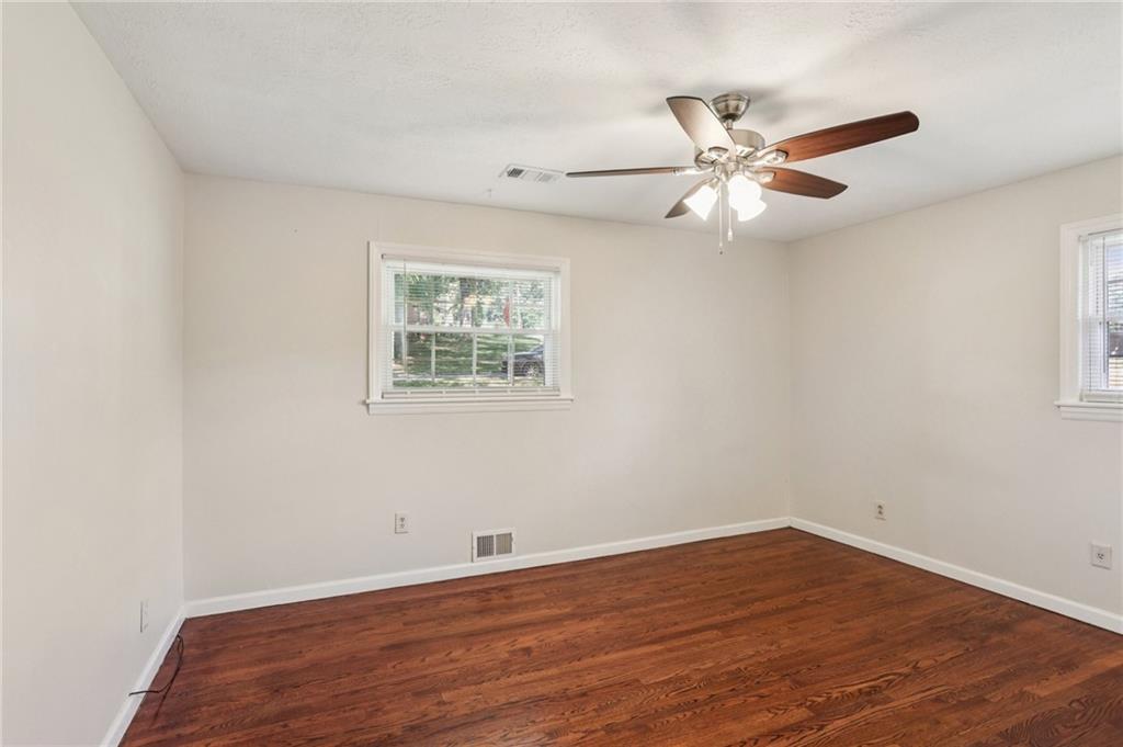 2370 Beaver Creek Road Smyrna, GA 30080 - Photo 16 of 23 a view of an empty room with wooden floor