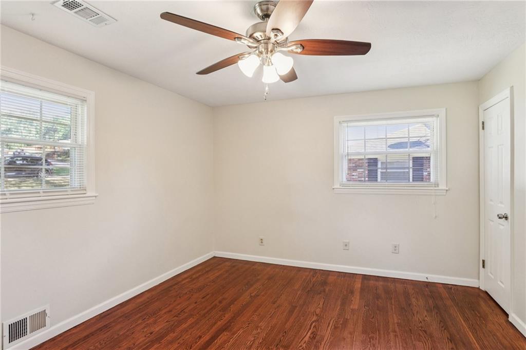 2370 Beaver Creek Road Smyrna, GA 30080 - Photo 17 of 23 wooden floor in an empty room with a window