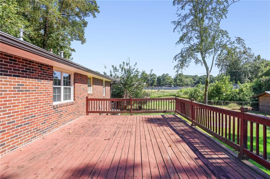 2370 Beaver Creek Road Smyrna, GA 30080 - Photo 21 of 23 a view of balcony with wooden floor and fence