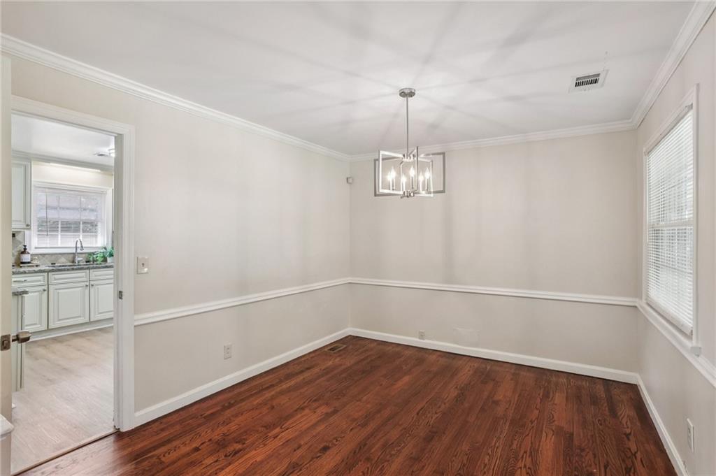2370 Beaver Creek Road Smyrna, GA 30080 - Photo 8 of 23 a view of empty room with wooden floor and window