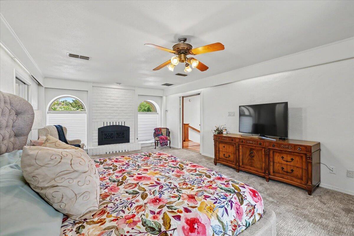 5 West Lakeshore Drive Ransom Canyon, TX 79366 - Photo 22 of 61 a living room with furniture and a flat screen tv
