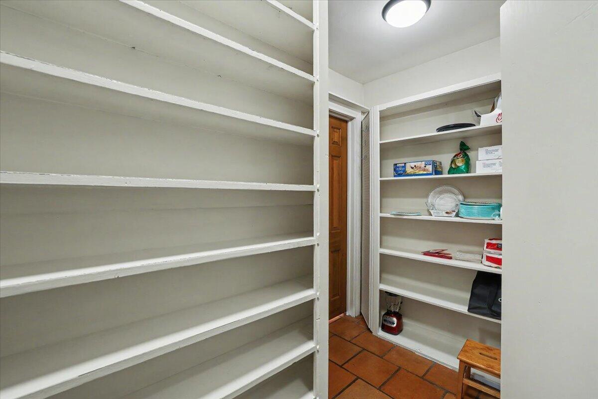 5 West Lakeshore Drive Ransom Canyon, TX 79366 - Photo 34 of 61 a view of walk in closet with empty racks