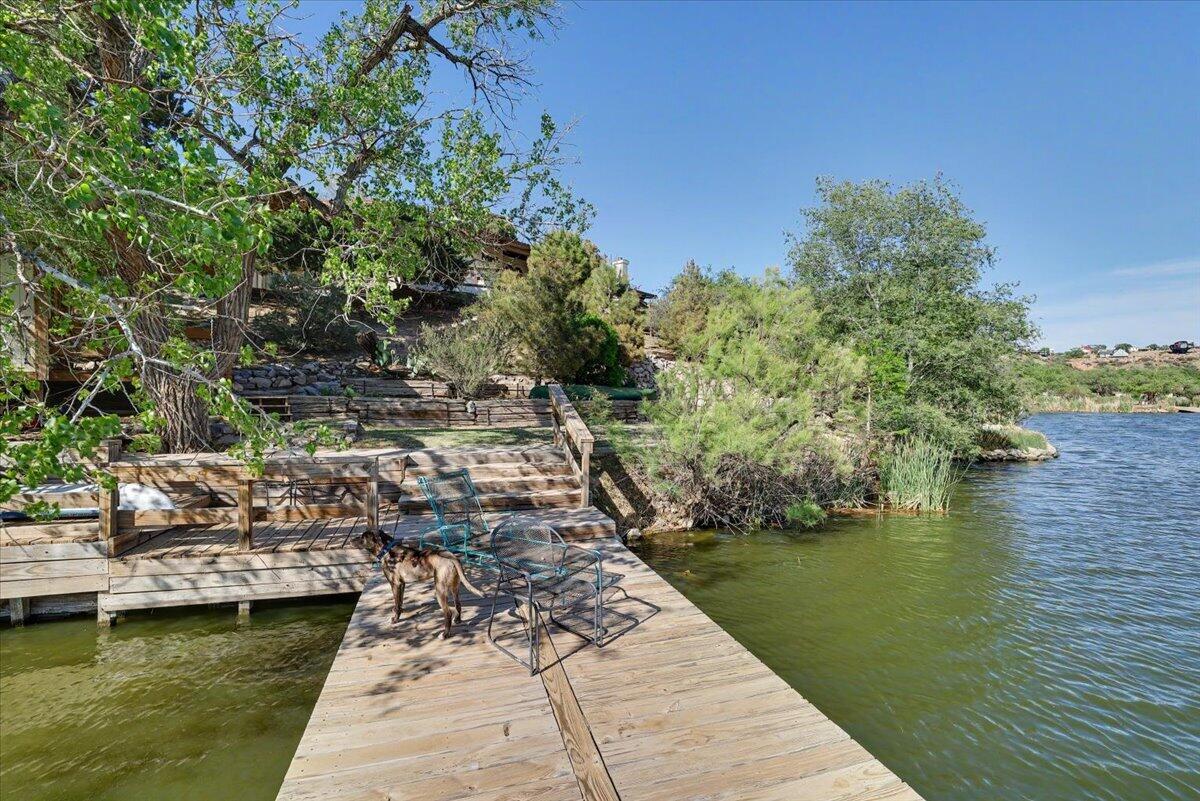 5 West Lakeshore Drive Ransom Canyon, TX 79366 - Photo 52 of 61 a view of a lake with a yard