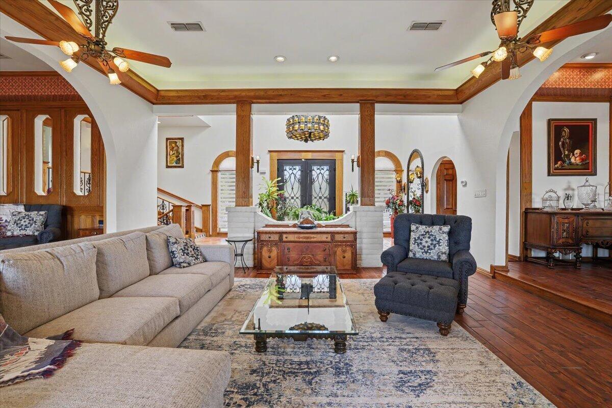 5 West Lakeshore Drive Ransom Canyon, TX 79366 - Photo 7 of 61 a living room with furniture fireplace and a large window