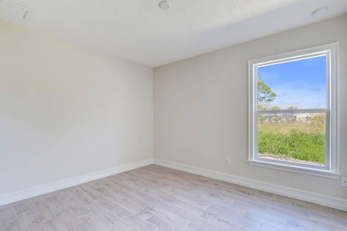 7090 Limestone Cay Road Jupiter, FL 33458 - Photo 16 of 24 Guest Bedroom
