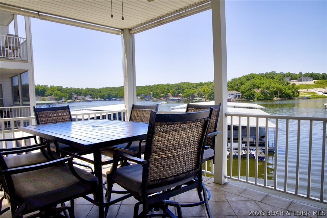 275 Flynn Road, Unit 106 Lake Ozark, MO 65049 - Photo 8 of 39 The large covered upper deck is the best place to