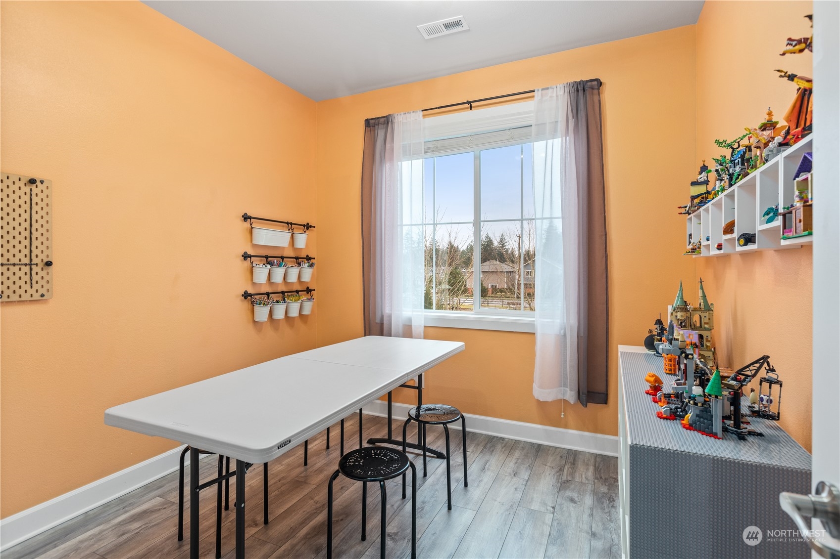 17517 40th Drive Southeast Bothell, WA 98012 - Photo 17 of 40 a view of a room that has a table and chairs in it