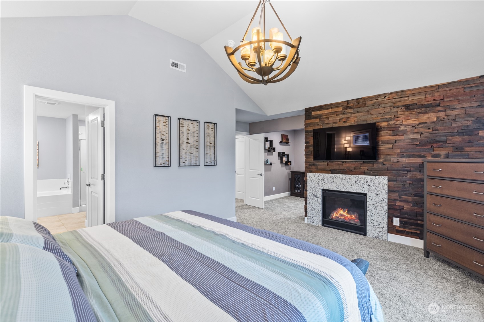 17517 40th Drive Southeast Bothell, WA 98012 - Photo 21 of 40 a bedroom with bed and a fireplace
