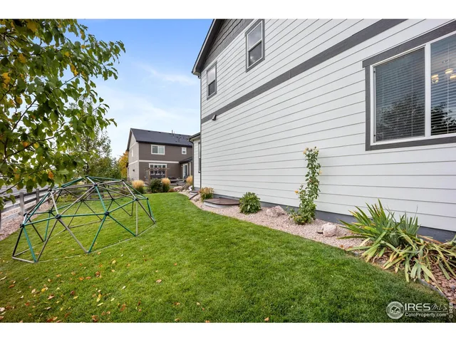 a house view with a backyard space