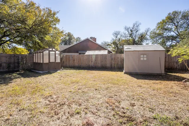 a house with trees in front of it