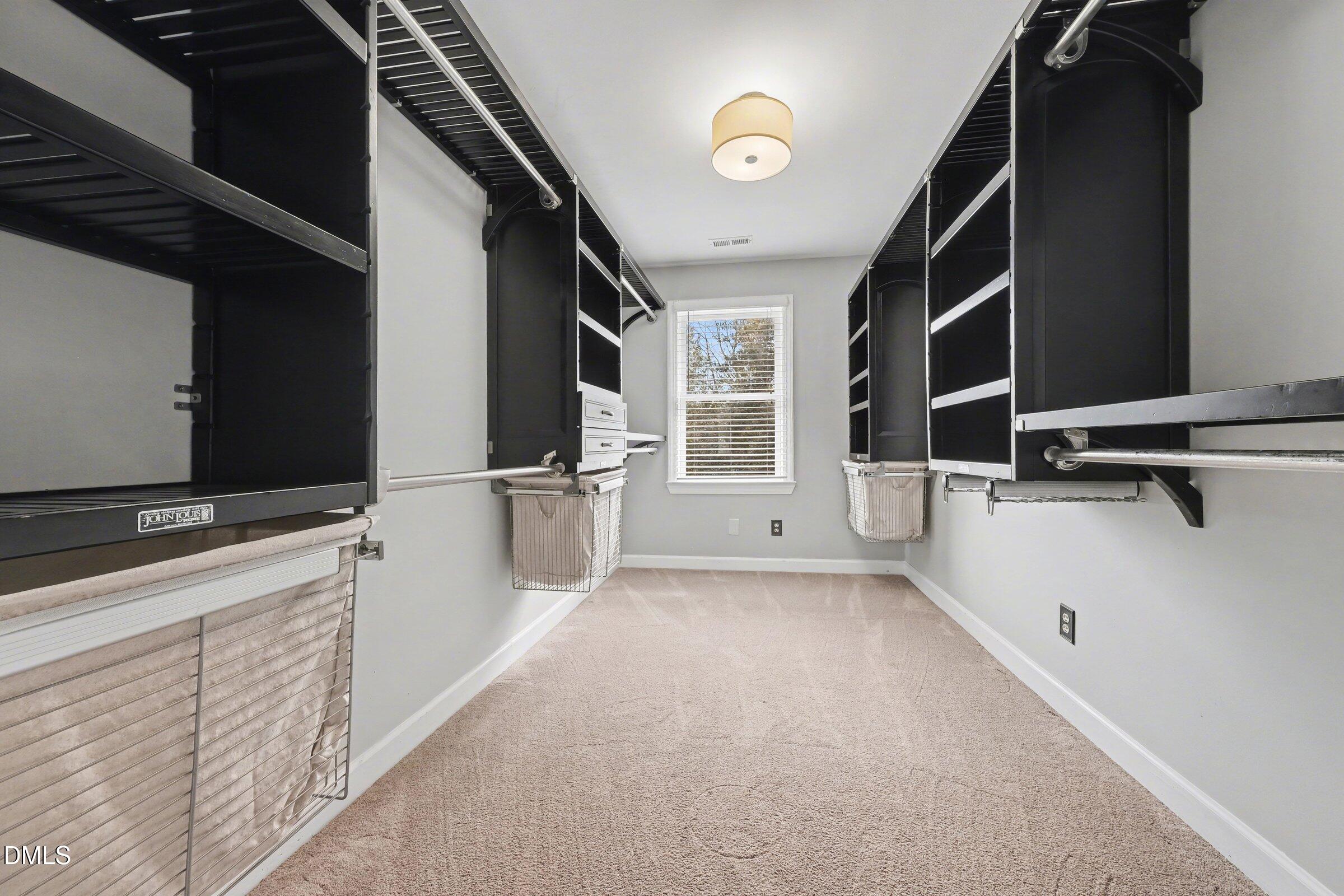 8325 Stryker Court Raleigh, NC 27615 - Photo 29 of 57 Primary Walk In Closet