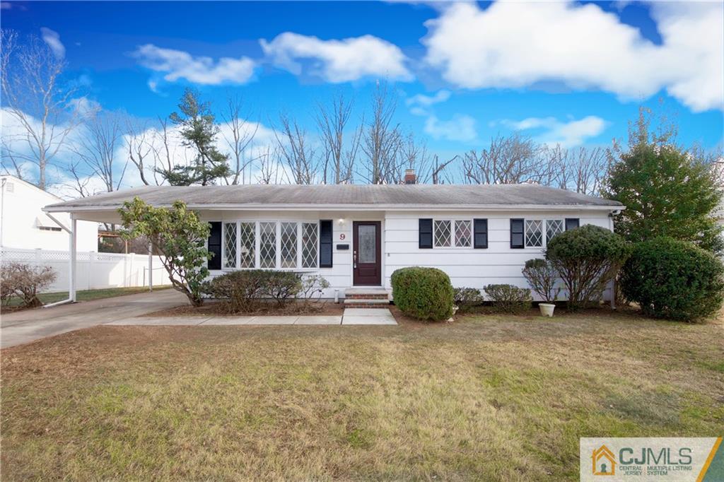 9 Brookside Road Edison, NJ 08817 - Photo 1 of 24 a view of a house with a yard and sitting area