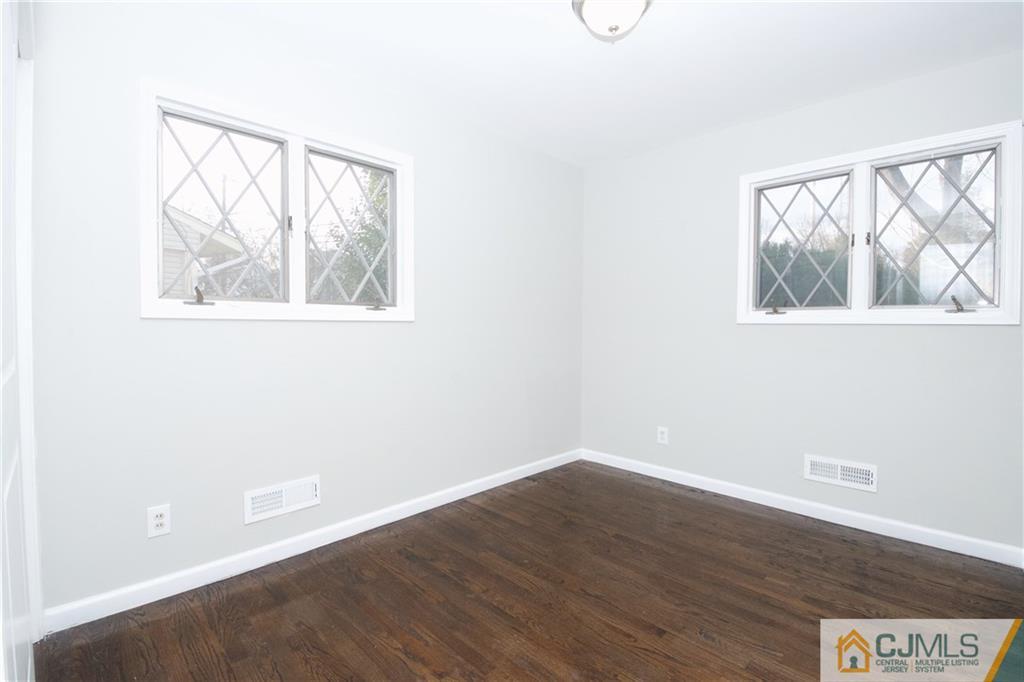 9 Brookside Road Edison, NJ 08817 - Photo 19 of 24 an empty room with a window