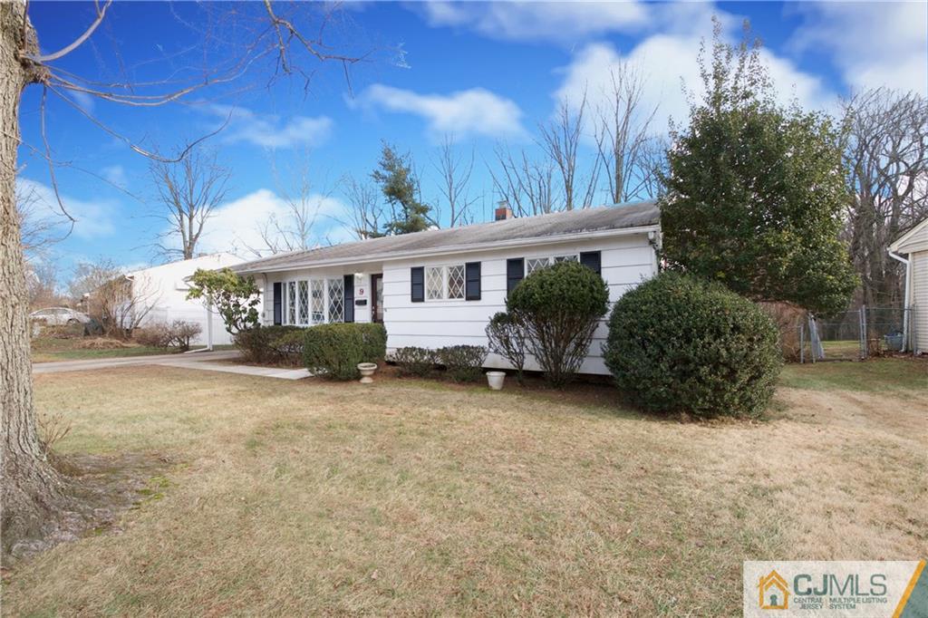 9 Brookside Road Edison, NJ 08817 - Photo 3 of 24 a view of a house with backyard and sitting area