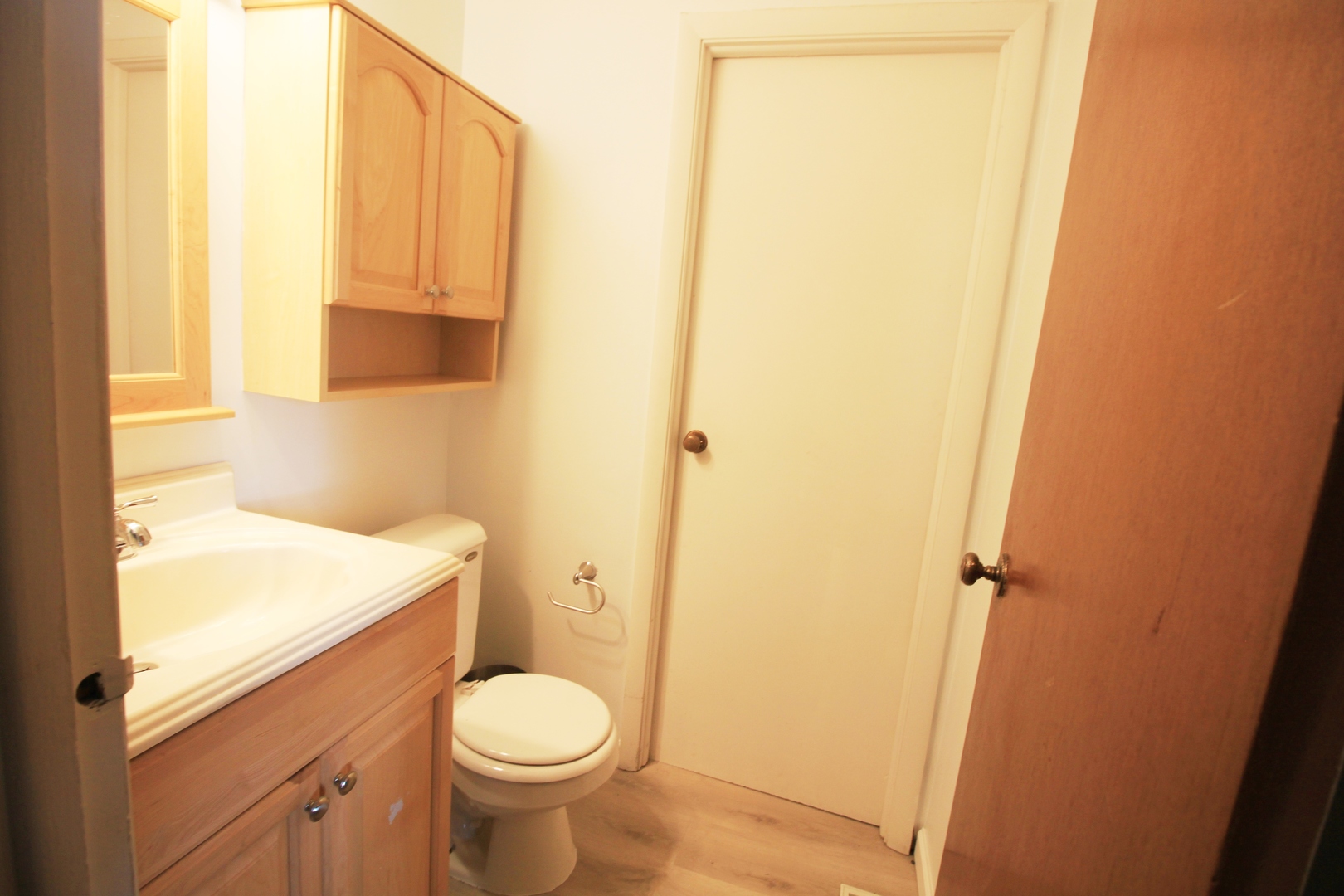 1370 Hassell Road Hoffman Estates, IL 60169 - Photo 12 of 17 a bathroom with a sink and a toilet