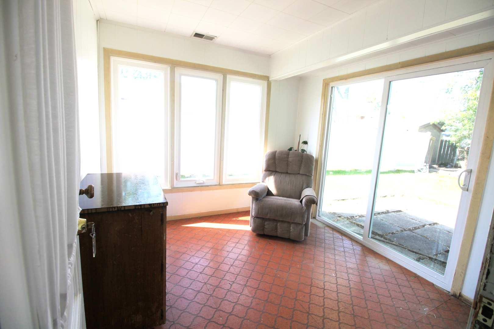 1370 Hassell Road Hoffman Estates, IL 60169 - Photo 13 of 17 a living room with furniture and a floor to ceiling window