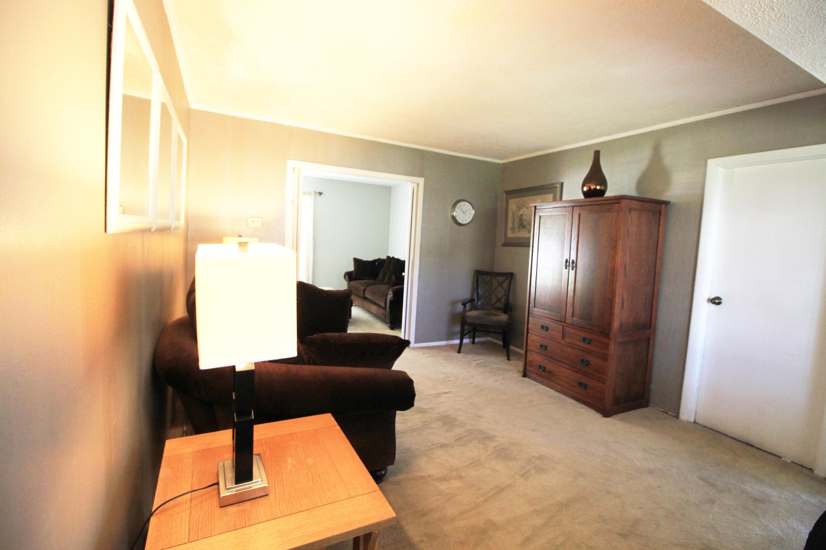 1370 Hassell Road Hoffman Estates, IL 60169 - Photo 5 of 17 a view of a living room filled with furniture