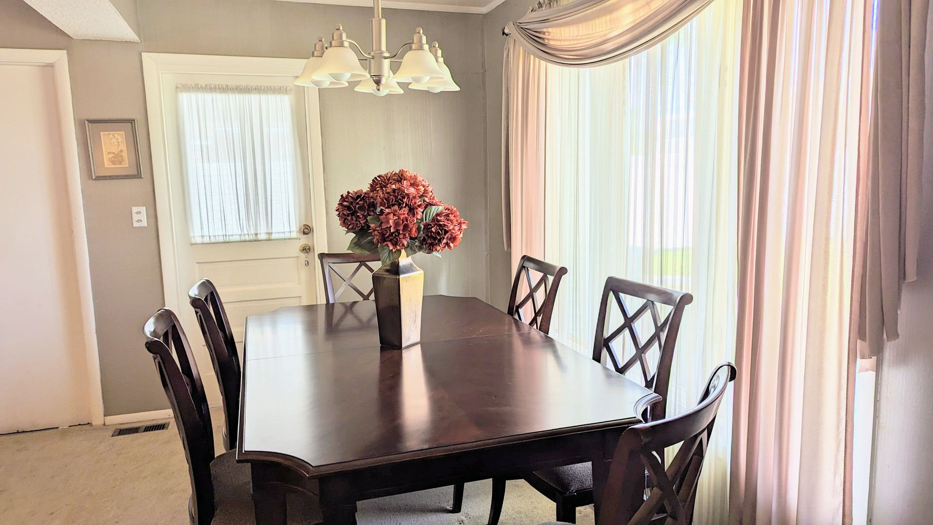 1370 Hassell Road Hoffman Estates, IL 60169 - Photo 7 of 17 a view of a dining room with furniture and window