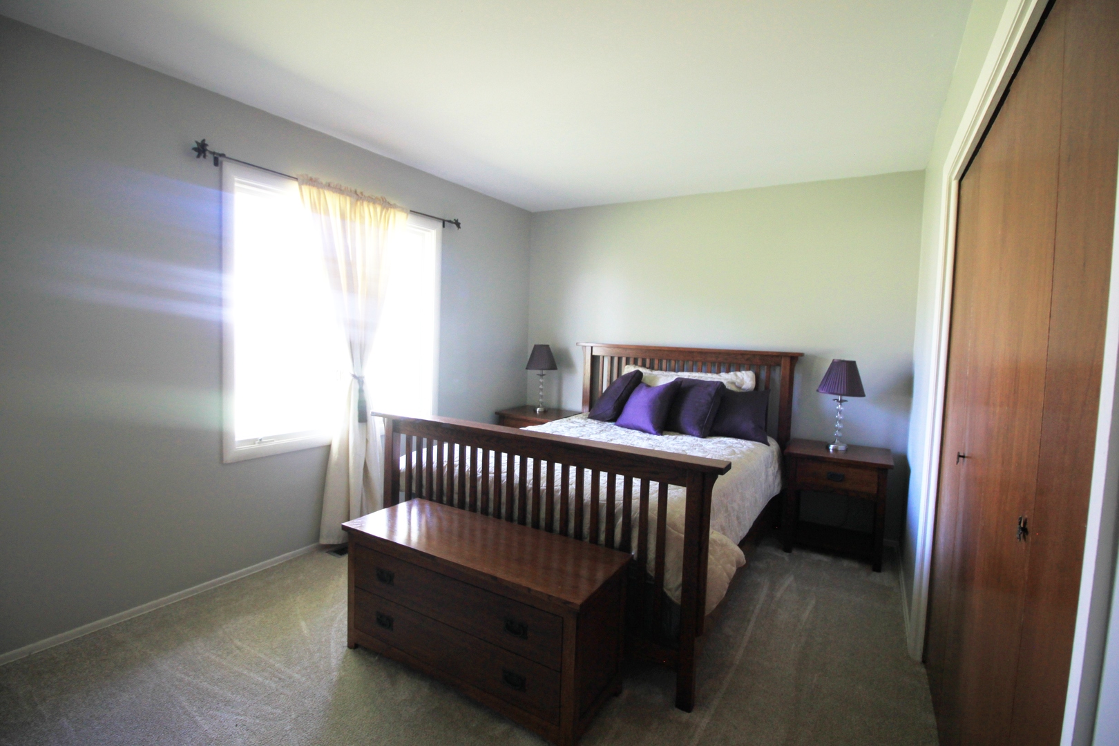 1370 Hassell Road Hoffman Estates, IL 60169 - Photo 8 of 17 a bedroom with a bed and window