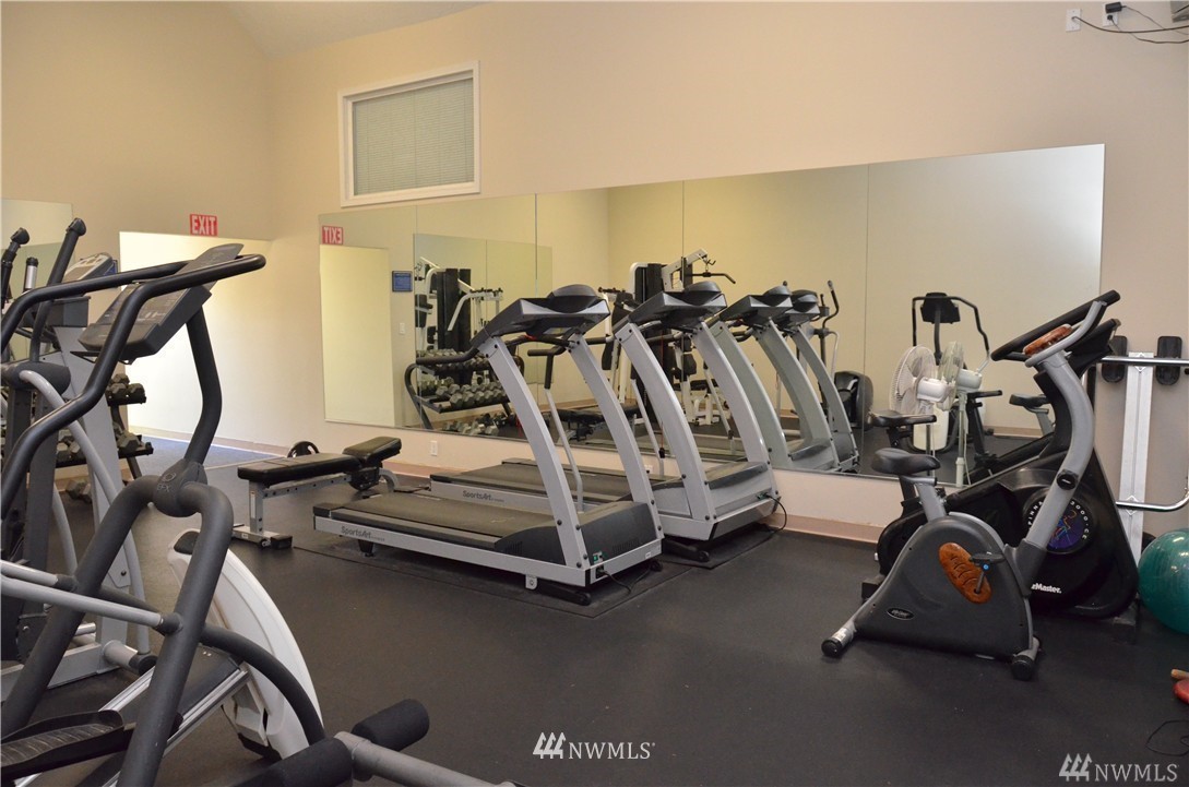 20330 Bothell Everett Highway, Unit C204 Bothell, WA 98012 - Photo 19 of 24 a view of a room with gym equipment