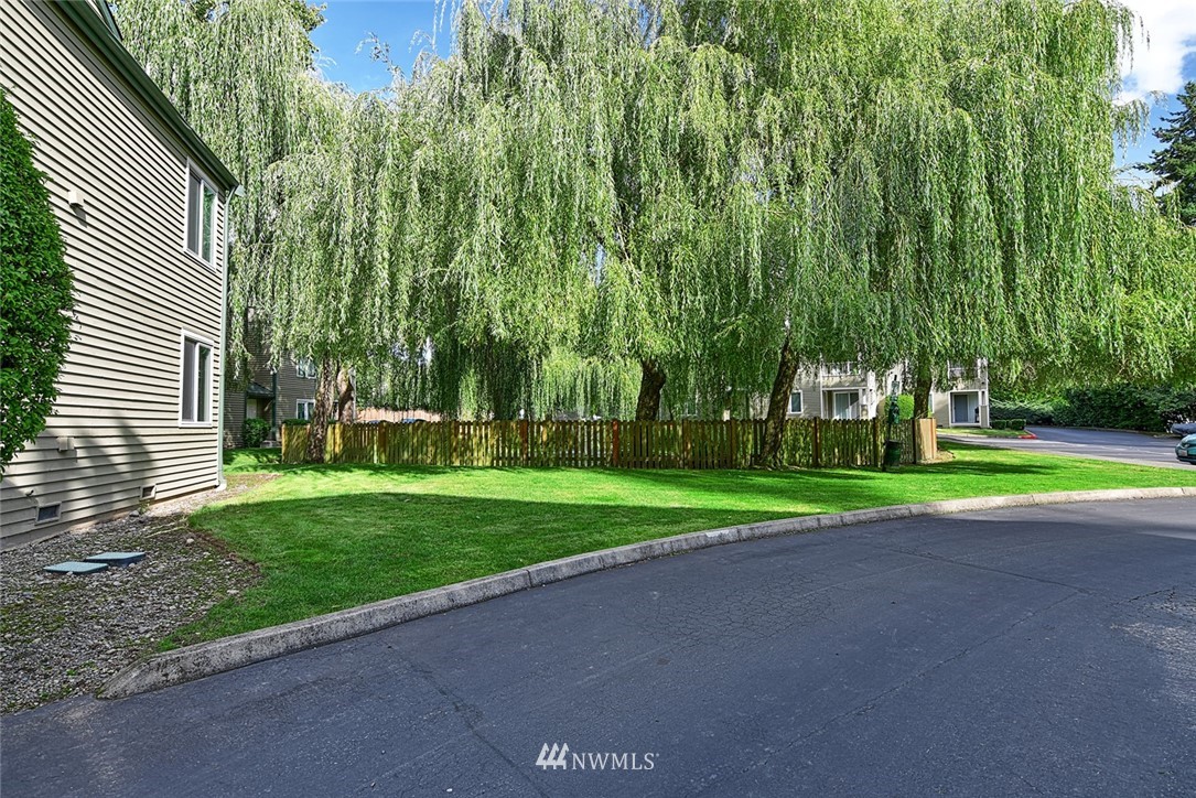 20330 Bothell Everett Highway, Unit C204 Bothell, WA 98012 - Photo 23 of 24 a view of road and trees