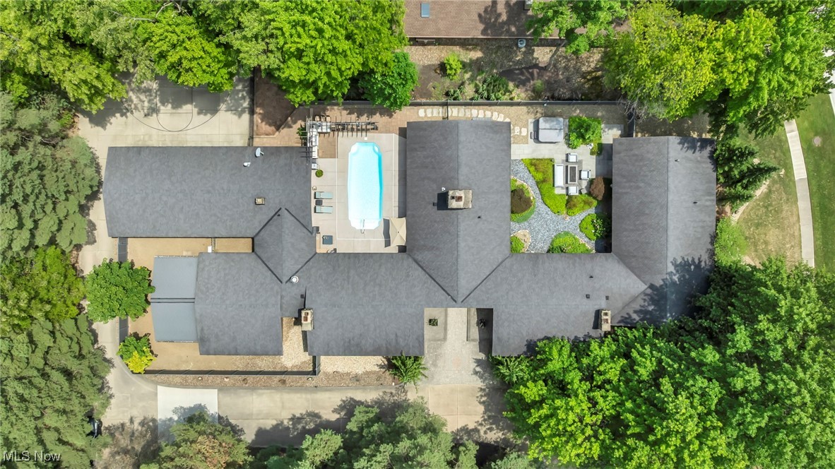 13079 Falling Water Road Strongsville, OH 44136 - Photo 47 of 50 Aerial view of property and surrounding area with a pool and garden sitting area with firepit and hottub