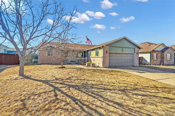 a view of a house with snow on the roof