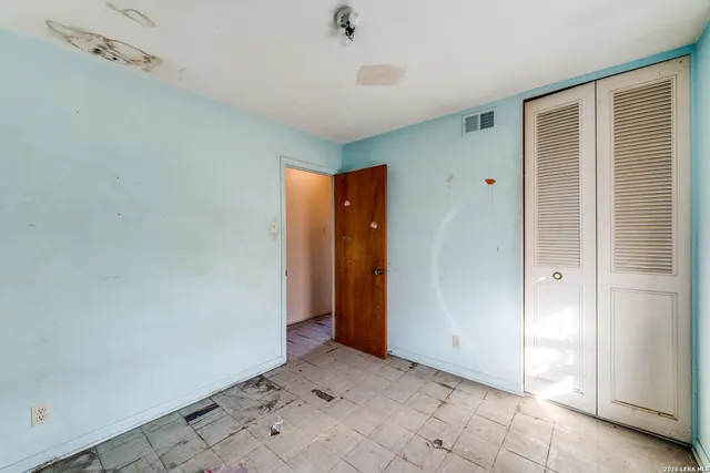 a view of an empty room with window