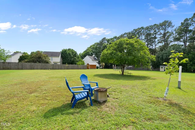 a view of a house with a big yard