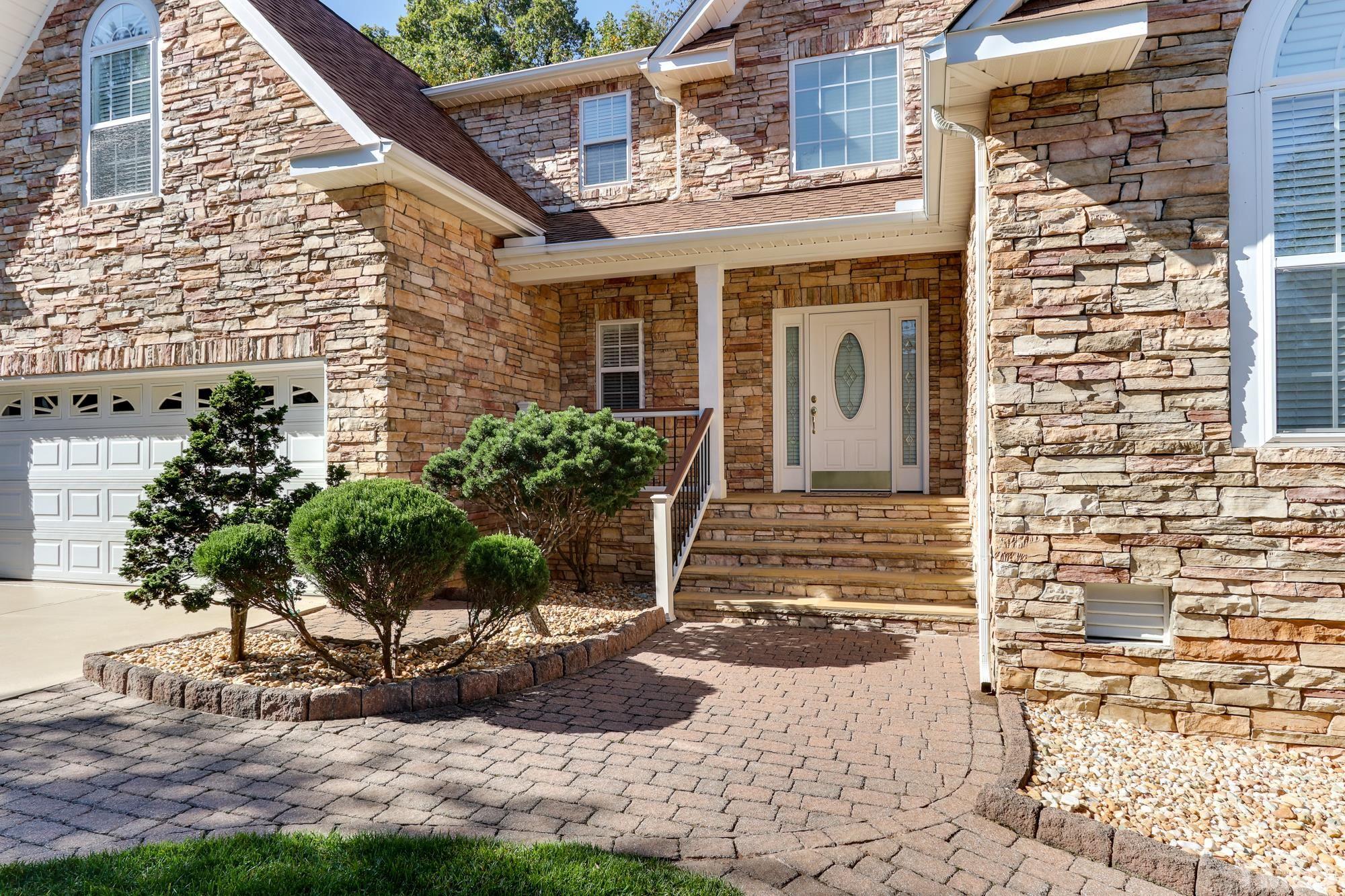 100 Mickleson Ridge Drive Raleigh, NC 27603 - Photo 3 of 59 a front view of a house with garden