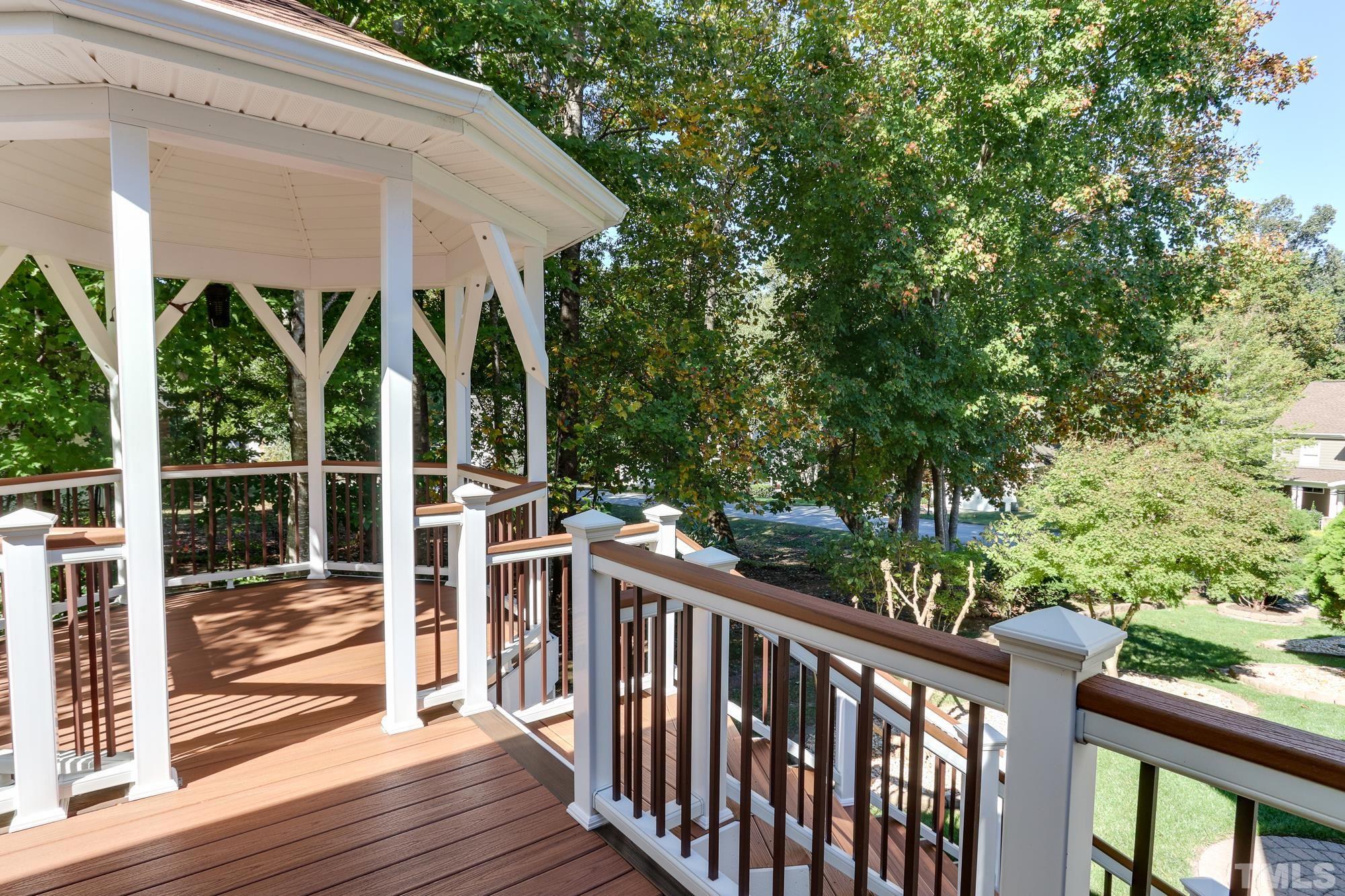 100 Mickleson Ridge Drive Raleigh, NC 27603 - Photo 36 of 59 a view of a two chairs and table in the balcony