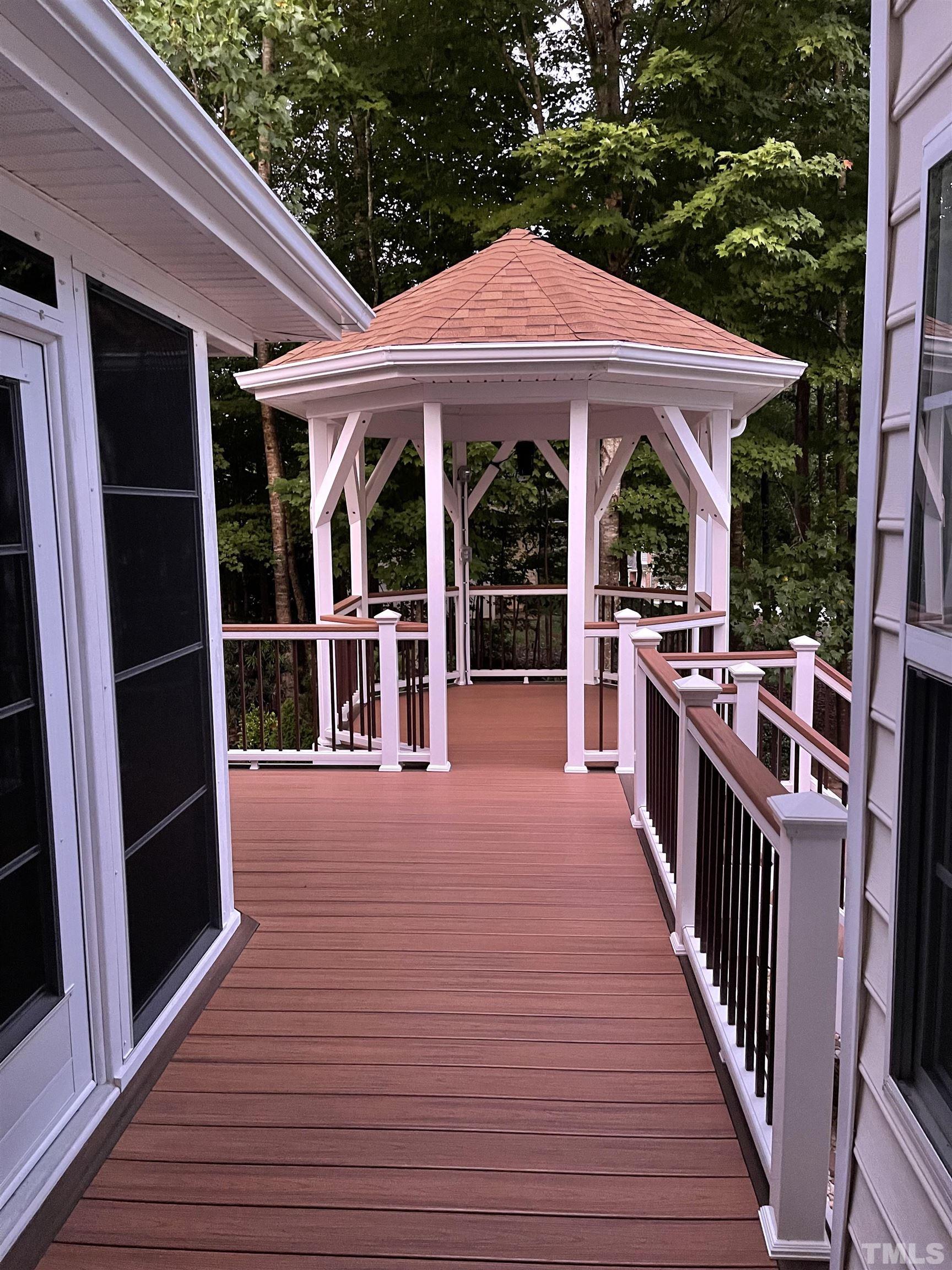 100 Mickleson Ridge Drive Raleigh, NC 27603 - Photo 39 of 59 a view of a house with wooden deck and yard