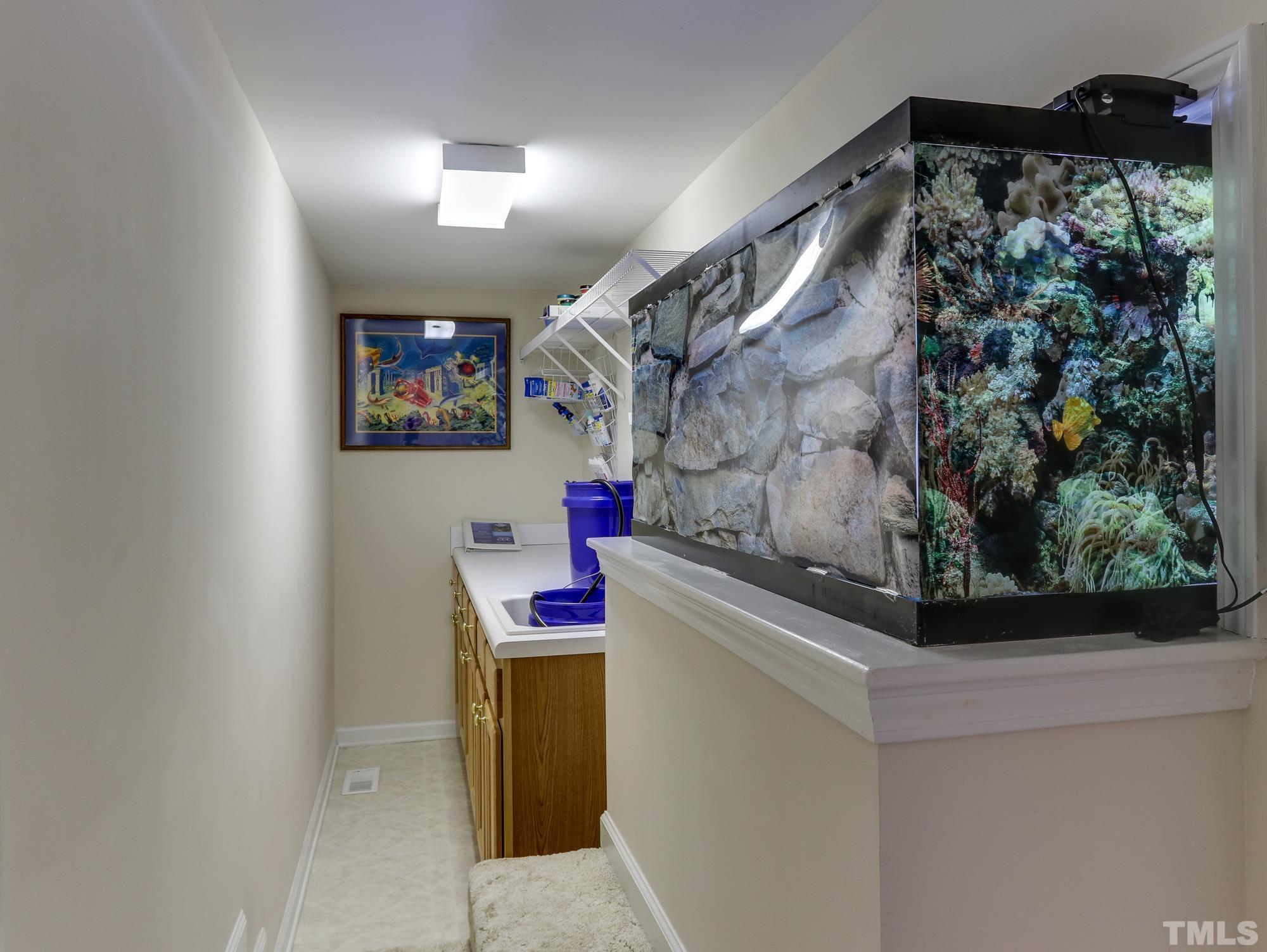 100 Mickleson Ridge Drive Raleigh, NC 27603 - Photo 42 of 59 a utility room with dryer and washer