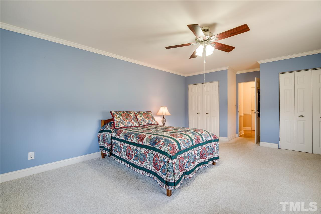 959 Lawson Chapel Church Road Roxboro, NC 27574 - Photo 18 of 25 a bedroom with a bed and window