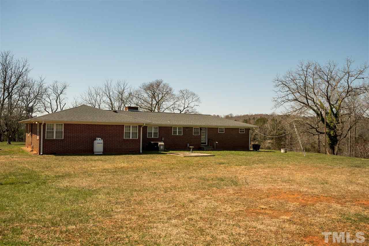959 Lawson Chapel Church Road Roxboro, NC 27574 - Photo 20 of 25 a view of a house with a yard