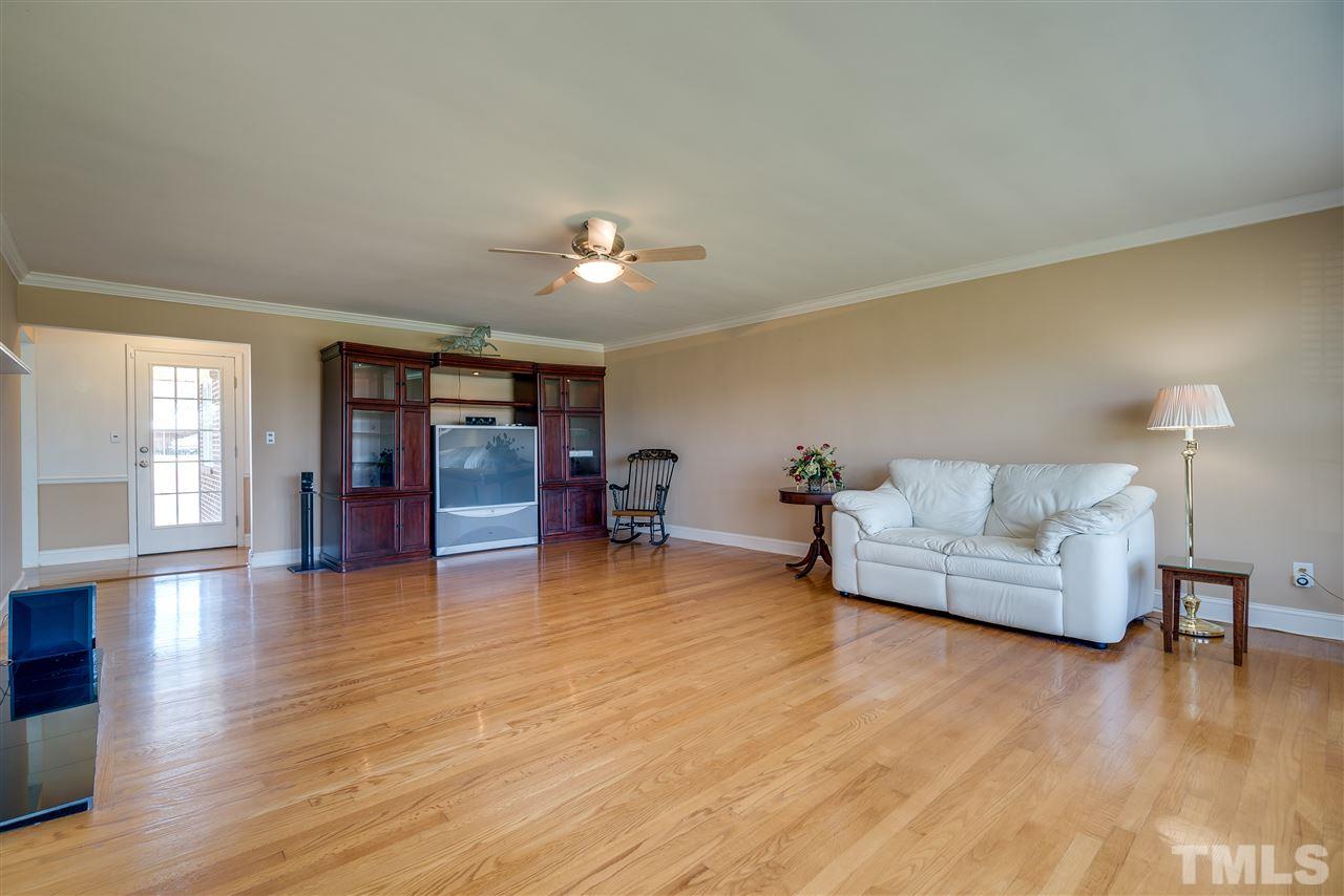 959 Lawson Chapel Church Road Roxboro, NC 27574 - Photo 3 of 25 a living room with furniture and wooden floor