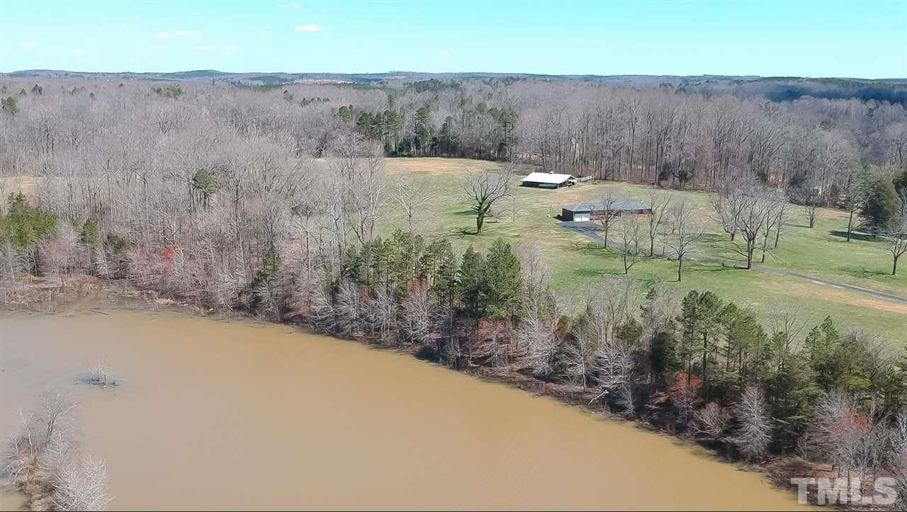 959 Lawson Chapel Church Road Roxboro, NC 27574 - Photo 24 of 25 an aerial view of residential house and green space