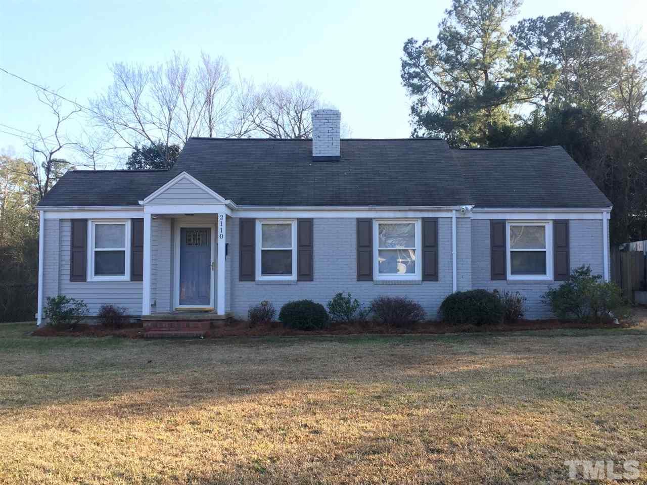 2110 Tudor Place Raleigh, NC 27610 - Photo 1 of 17 a front view of a house with garden